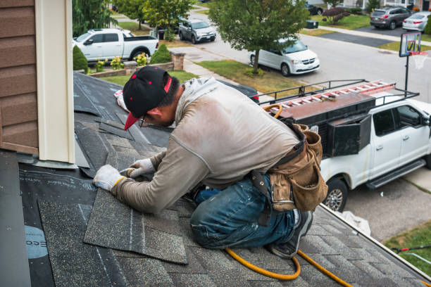 Professional Roof Inspection technician working in Weston, MA